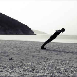 Defying gravity on a beach in Greece.