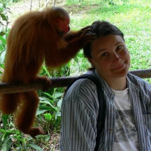 Getting my hair did with a uakari friend Peru