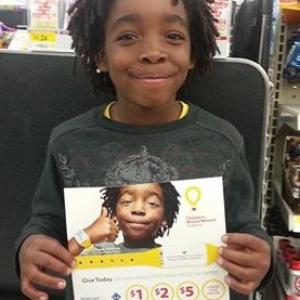 Samuel was chosen to be Childrens Miracle network Nation Wide Ad campaign Model Found himself in the store!!