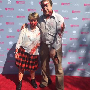Andrielle Andie Sliwa in full makeup for her role as Principal Zombie 1 in Zombie Day Apocalypse poses with her father David Sliwa who played Principal Zombie 2 in the same short film