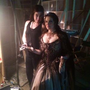 On set for Salem Season 2 with Lucy Lawless after dressing her in a Human Hair Dress we custom made for her