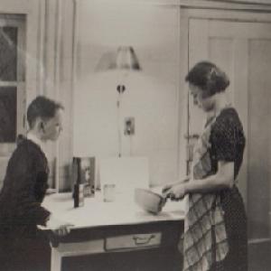 Dan and Betty Jane Pike using electricity for first time, circa 1930s