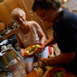 Betty Jane Keene and Courtney Patterson Baldwin peel apples