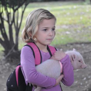 Lindsey holding costar Wilson while facing the bully during filming of Arlo The Burping Pig Dec 2015