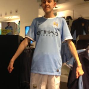 Me wearing Manchester City's 2013/14 kit in the store on official release day, I never bought it but have about 5 other official shirts.