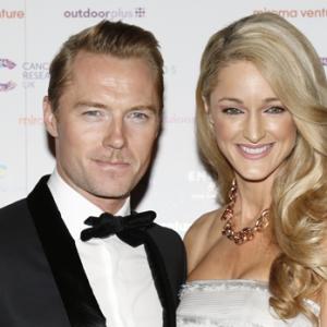 Storm and husband Ronan raise over £1million for Cancer Research UK at their annual the Emeralds & Ivy Ball, London 2015.