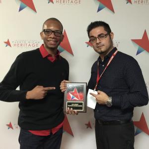 Producer Damian Bastar (left) and Filmmaker Adam Gonzalez (right) holding their 2015 IPRHFF People's Choice Award for their movie 