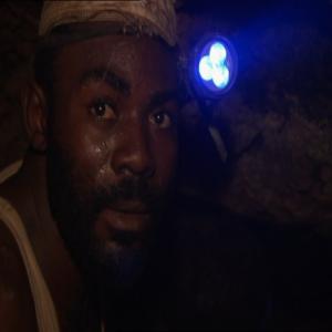 A miner in Congo Risking his life in the dangerus mines to get mineral for Our cell Phones From the documentary series Connecting People 2009