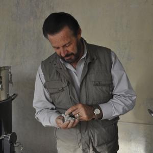 Gary Young inspects the essential oil distilling process