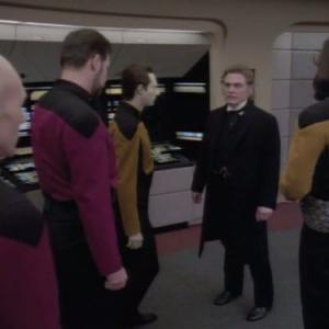 Still of Michael Dorn, Jonathan Frakes, Brent Spiner, Patrick Stewart and Daniel Davis in Star Trek: The Next Generation (1987)