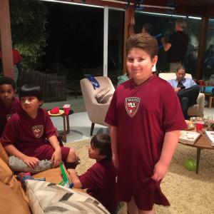 Zachary on set of All Stars at the soccer team party
