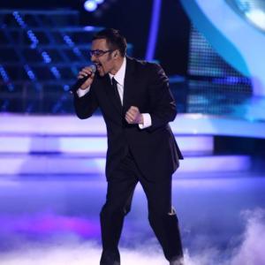 Pavel Vladimirov as George Michael in the TV show 