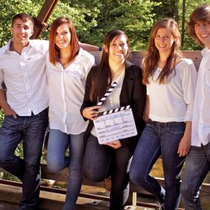 Cast and director in the middle of feature film 
