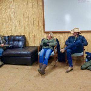 Theresa Cook, Nathan Keyes, and Jon Voight (far left corner, boots) relaxing between scenes on the set of JL Ranch.
