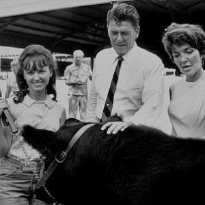 Ronald Reagan with wife Nancy campaigning at a county fair C 196465