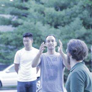 from left to right director of photography Jack Yan Chen director Guina Dutra and producer Dennis Nicholson during the shooting of the final shot of Goodbye Dear Madness
