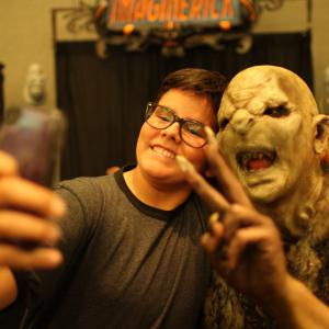 Alan Maxson poses for a picture with a fan at Monsterpalooza 2014