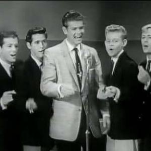 2nd from the right with the big ears early television