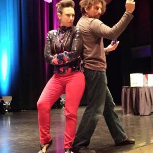 Laurn Laurino assists David Wolfe raffling off the Nutri Bullet at a live event