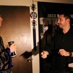 Discussing the scene with actor Don Yannacito, during filming of THE RETURN OF THE DRAGON SWORD.