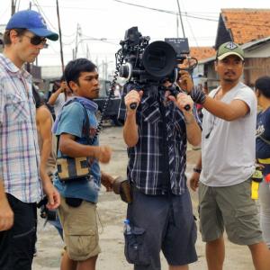 Corey Pearson directing Message Man on set in Jakarta with DOP Neil Cervin