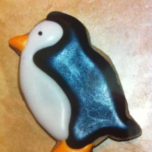 How It All Began  I was icing cookies for my children and when I finished they all had pompadours! I cracked up and the idea for Elvis the Penguin was born